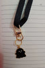 First view of black colored keychain featuring a cute spooky adorable ghost design.