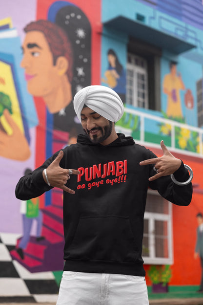 Fourth front view of a male model wearing an black hoodie with the text "Punjabi Aa Gaye".