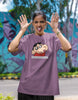 First front view of female model wearing an oversized dirty purple tee featuring Shinchan with the text 