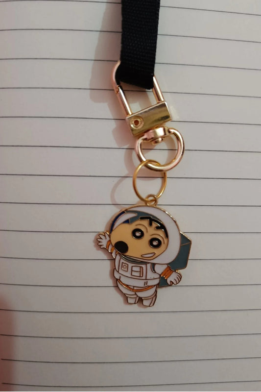 Second view of a cute keychain featuring Shinchan in a space suit, exploring the cosmos.