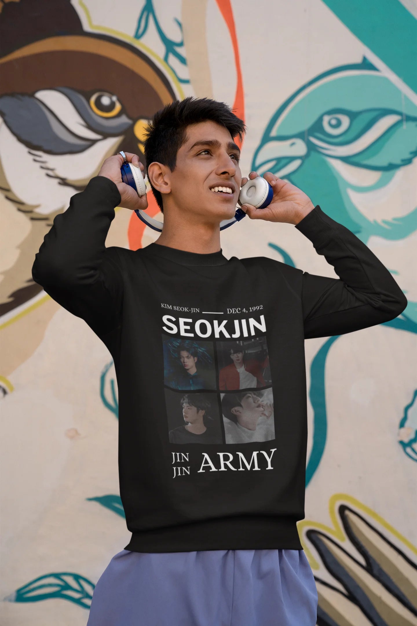 First front view of male model wearing an black sweatshirt featuring a bold design inspired by BTS member Jin. Ideal for BTS fans (ARMY) and K-Pop enthusiasts looking for unique Korean Wave fashion.