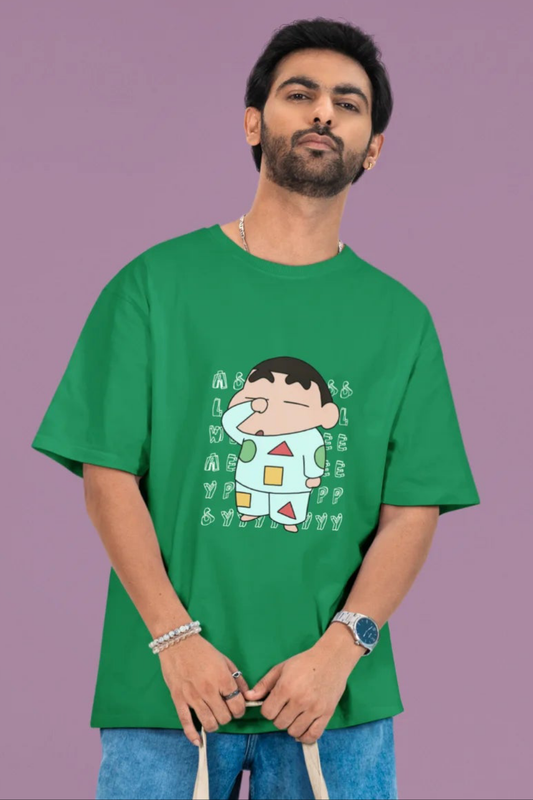 2nd front view of a male model wearing a forest green oversized t-shirt featuring  Shinchan looking sleepy.