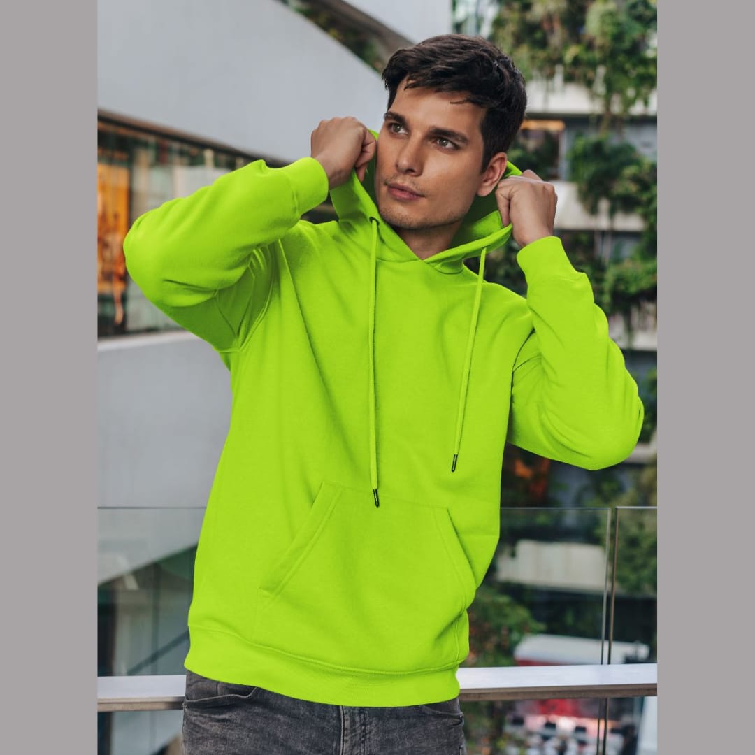 Front view of a male model wearing a parrot green premium quality, pure cotton hoodie.