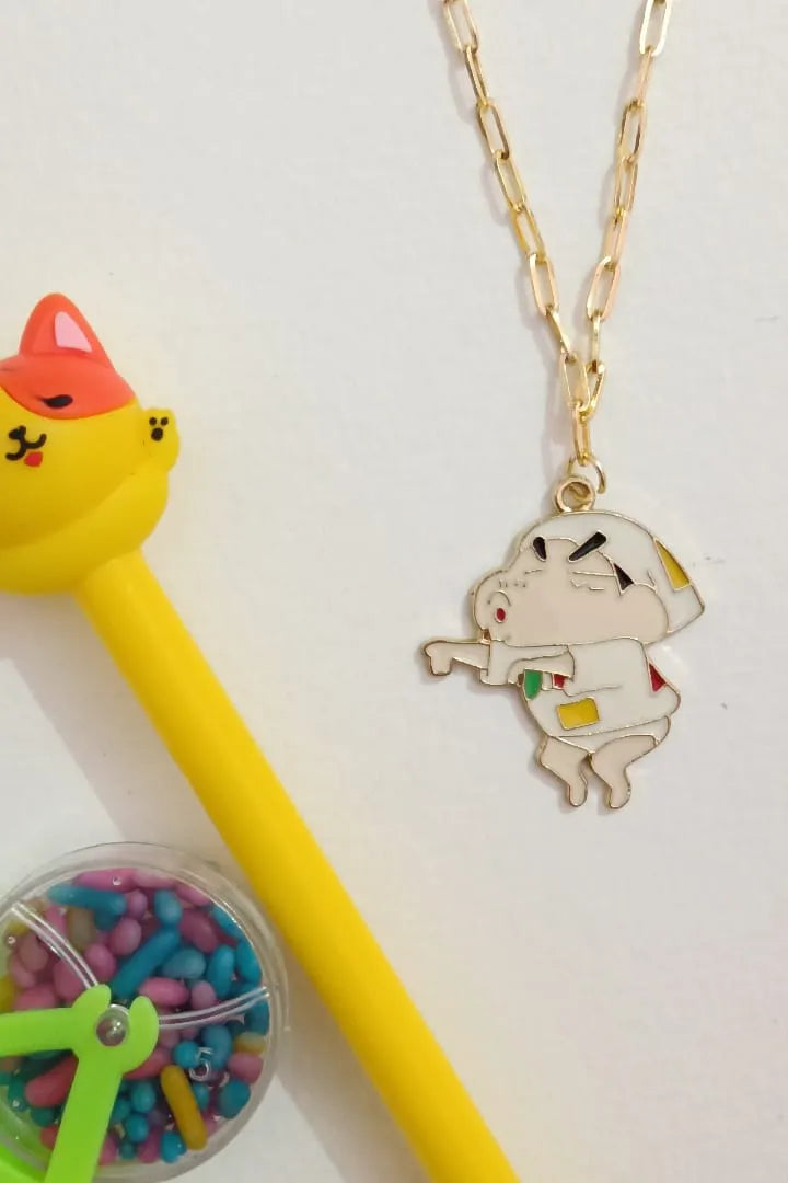 First image of an anti tarnish gold chain necklace featuring a mischievous Naughty Shinchan design.