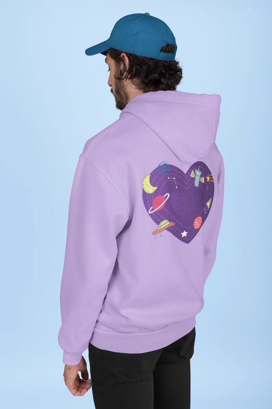 Back view of a male model wearing an lavender hoodie with the "Paradise" album artwork by Coldplay.