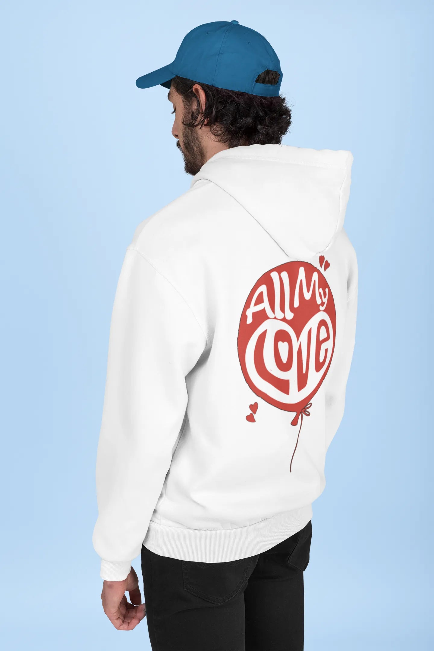 Back view of a male model wearing a off-white hoodie with a heart design and the text "All My Love".
