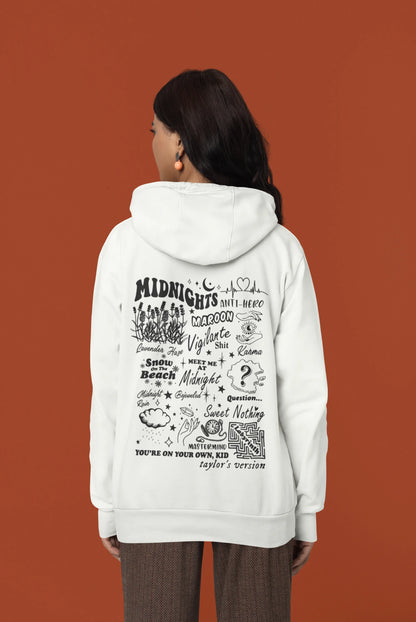 Back view of a female model wearing an off-white Midnights-inspired hoodie. Perfect for Swifties and Eras Tour fans.