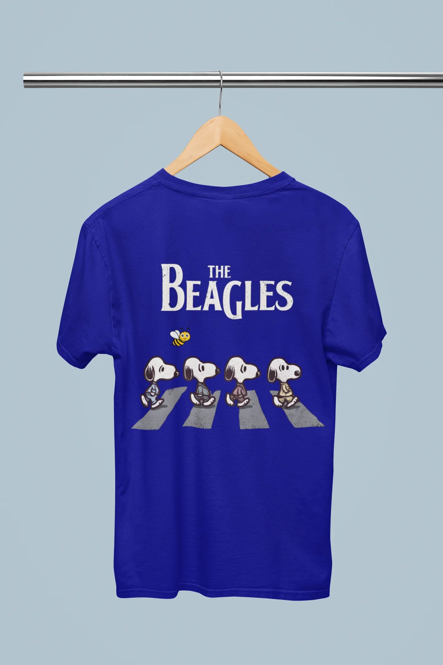 Back view of t-shirt on a hanger showcasing blue oversized tee with a The Beagles animated series themed design, featuring the cool canine quartet from ourt disney collection of oversized tees.