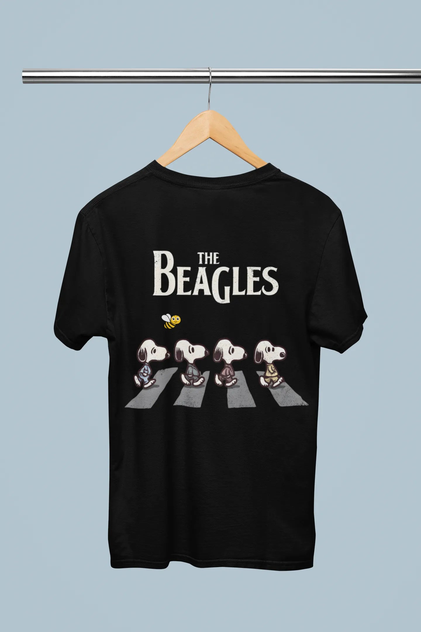 Back view of t-shirt on a hanger showcasing black oversized tee with a The Beagles animated series themed design, featuring the cool canine quartet from ourt disney collection of oversized tees.