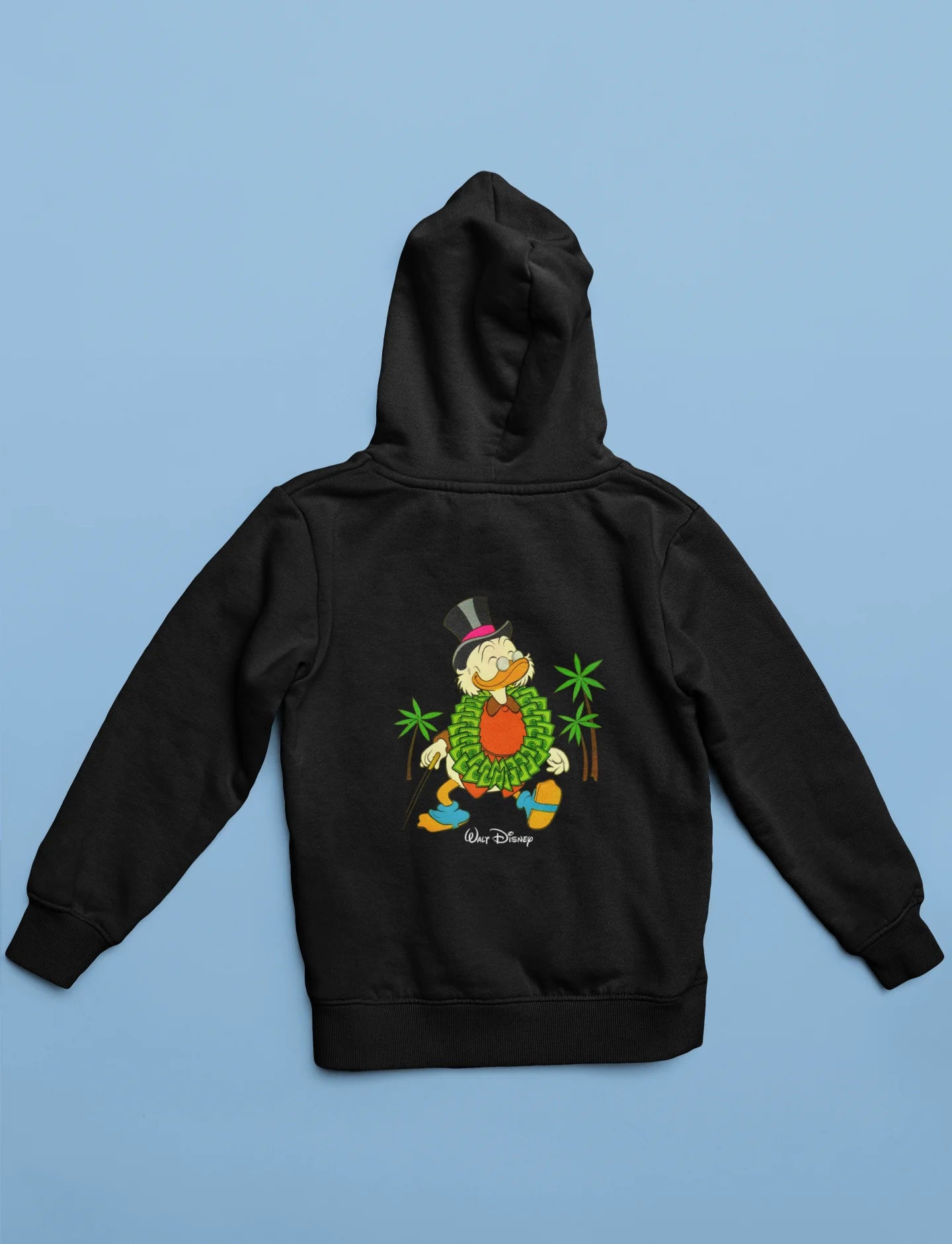 Back view of a black hoodie with a Disney Uncle Scrooge design, showing dollar bills raining down on him.