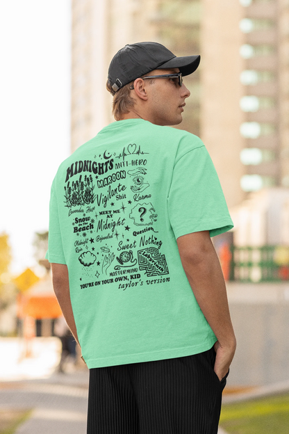 Back view of man wearing mint green Oversize T-shirt featuring Taylor Swift Midnight design