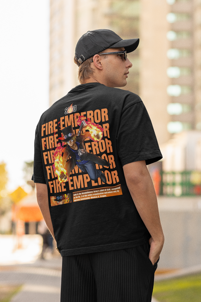 Back view of a male model wearing a black oversized t-shirt featuring Sabo with the text "Flame Emperor."