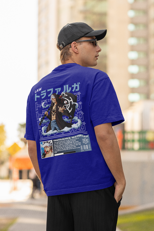 Back view of a male model wearing a royal blue oversized t-shirt featuring Trafalgar Law from the One Piece anime.