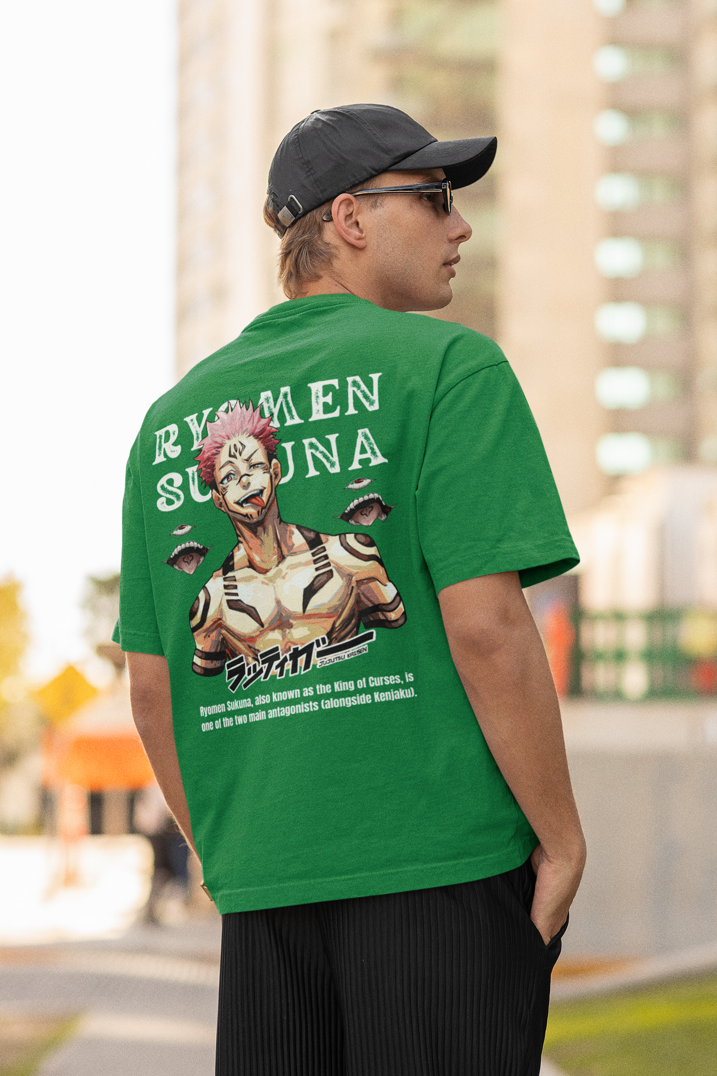 Back view of a male model wearing a forest green oversized t-shirt featuring Ryomen Sukuna with the text "I'm Sakuna."