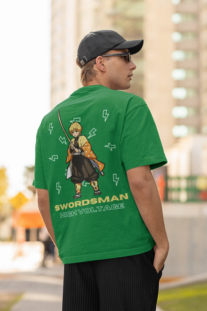 Back view of a male model wearing a forest green oversized t-shirt featuring Zenitsu Agatsuma with the text "High Voltage".