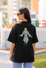 Back view of woman wearing black Oversized T-shirt featuring Taylor Swift Midnight design