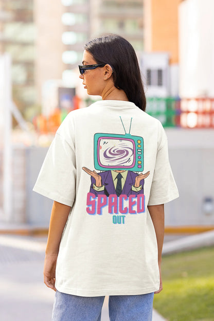 Back view of a female model wearing a white oversized t-shirt with a bold graphic that reads "Need Some Space" on the front. The design incorporates subtle hints of the Milky Way galaxy and the solar system on the back.