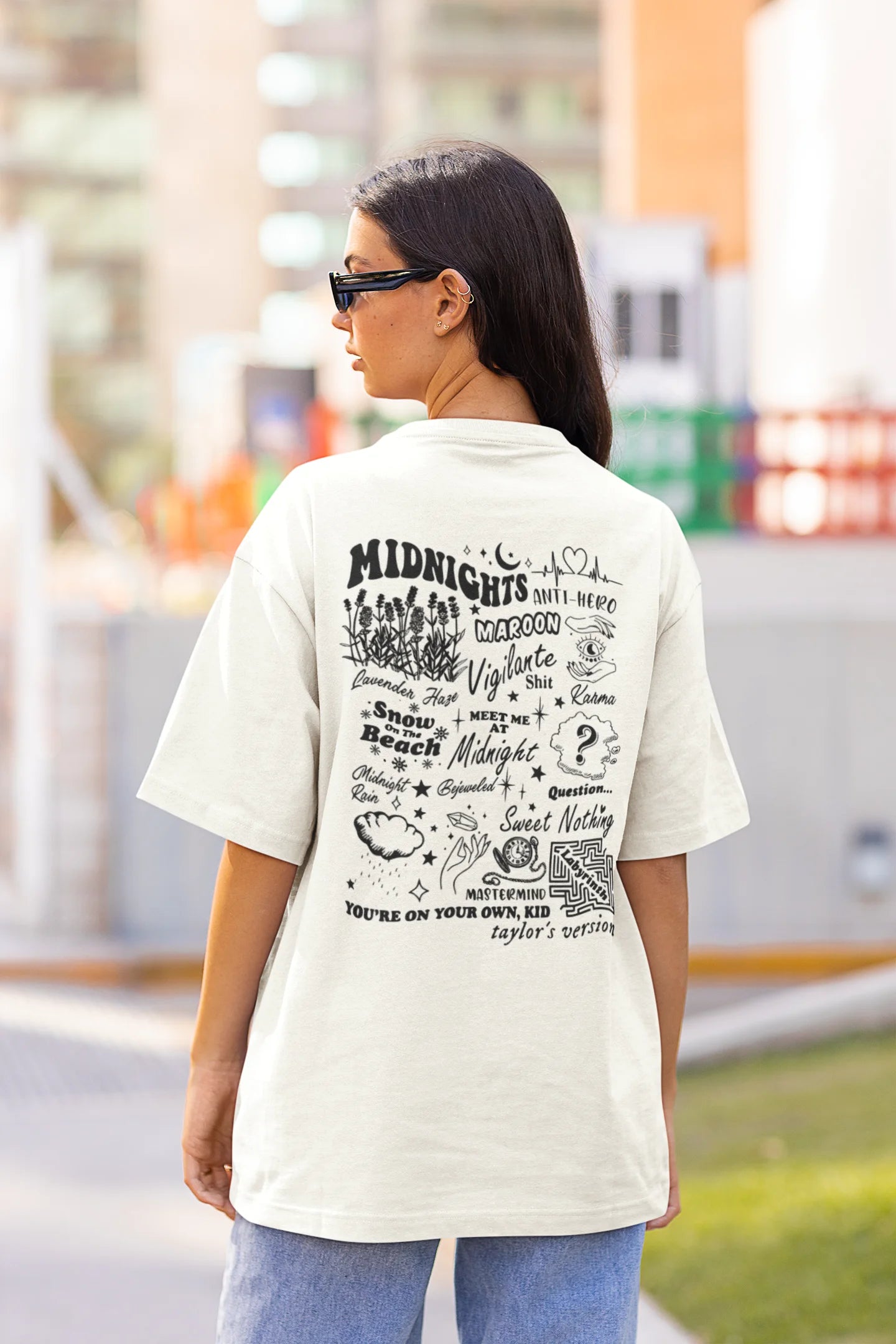 Back view of woman wearing white Oversize T-shirt featuring Taylor Swift Midnight design