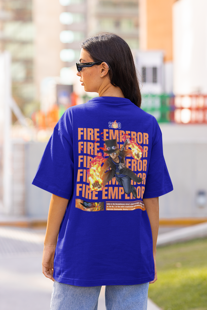 Back view of a female model wearing a royal blue oversized t-shirt featuring Sabo with the text "Flame Emperor."