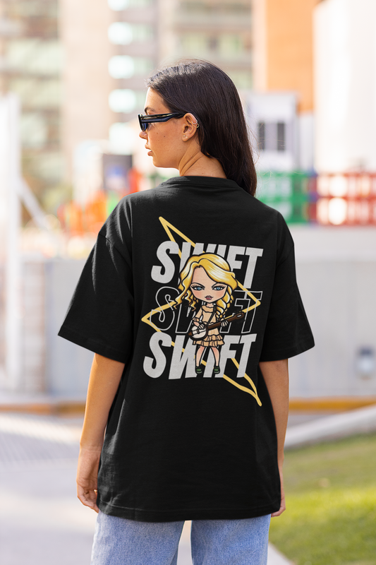 Back view of female model flaunting Taylor Swift-themed black oversized tee, epitomizing rockstar chic with nods to Taylor's Version and Eras Tour.