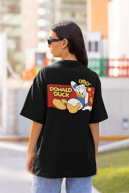 Back view of female model wearing black oversized Disney collection t-shirt featuring a classic Donald Duck design.