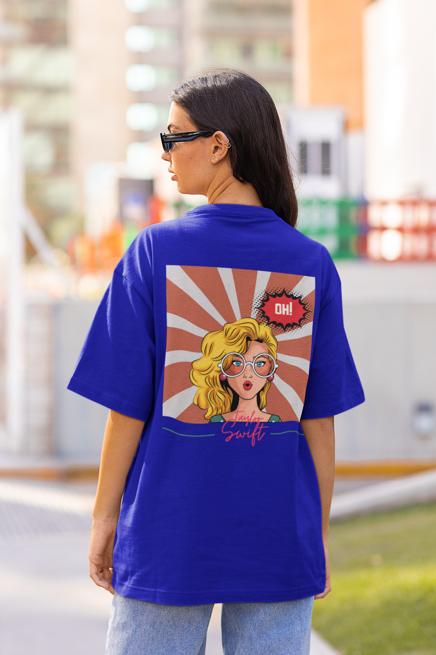 Back view of model showcasing Taylor Swift-inspired Oh Oh design blue oversized t-shirt from Swiftie Collection