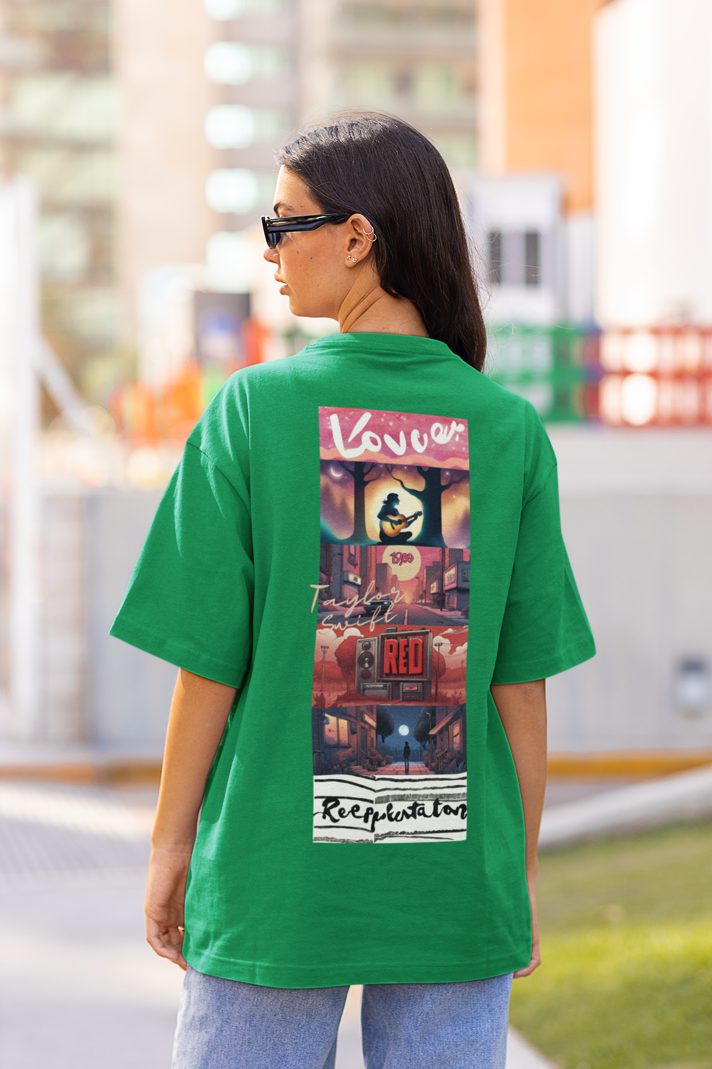 Back view of female model showcasing forest green oversized Taylor Swift t-shirts inspired by her "Lover" album (Taylor's Version).