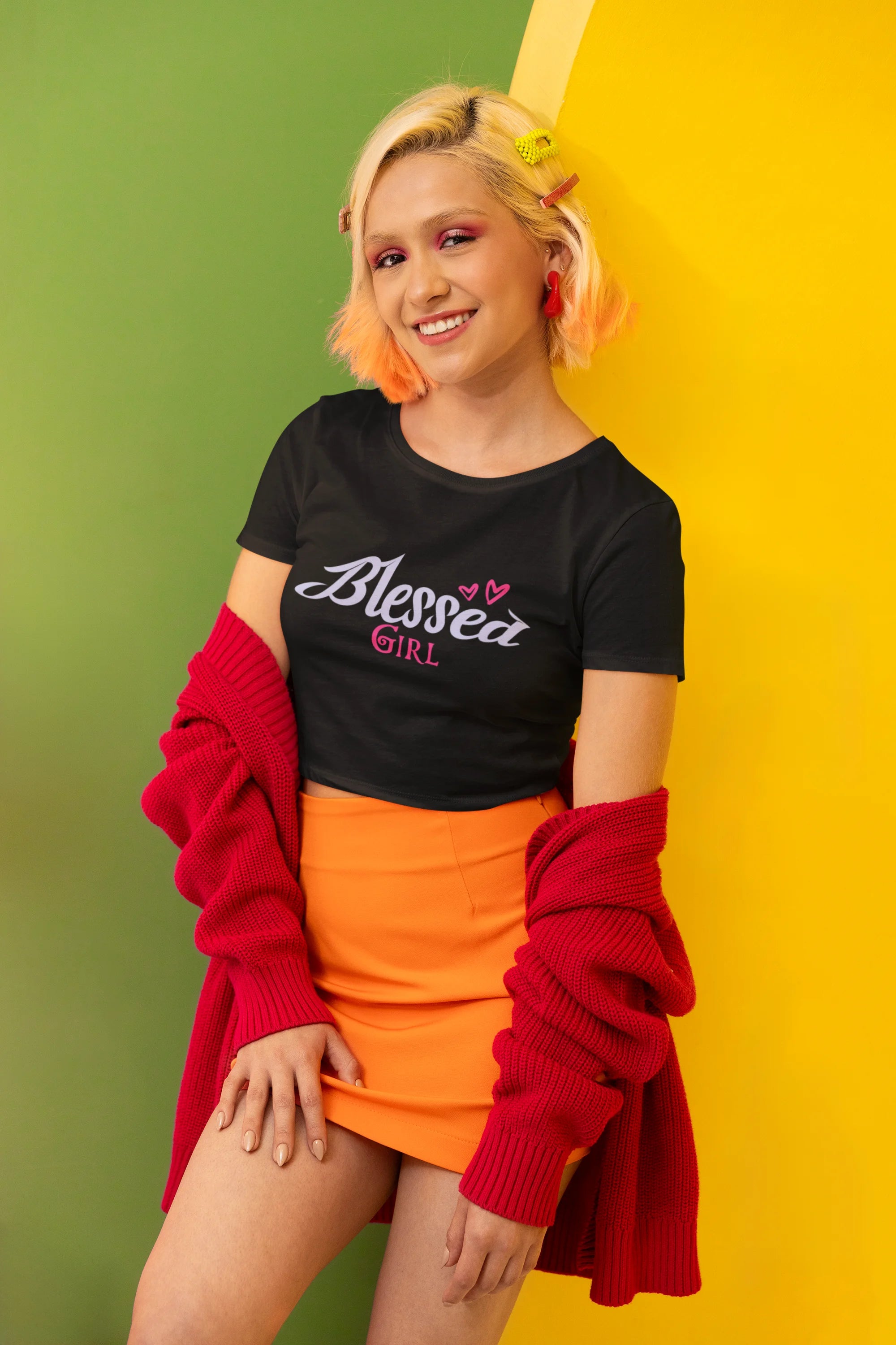 Side view of a female model wearing a black crop top with "Blessed Girl" design, exuding positivity and confidence.