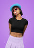 Second front view of model wearing a stylish black crop top, exuding confidence and attitude.