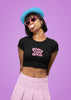 Second front view of female model wearing a stylish black crop top with a bold 100% that bitch design, exuding confidence and attitude.