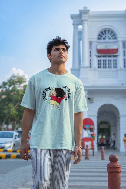 Third front view of male model wearing an oversized mint green tee with Shinchan dancing and the text "Balle Balle". A perfect blend of anime and Bollywood for Shinchan fans.