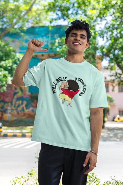 Second front view of male model wearing an oversized mint green tee with Shinchan dancing and the text "Balle Balle". A perfect blend of anime and Bollywood for Shinchan fans.