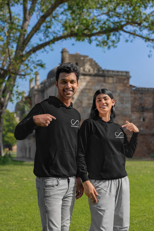 2nd front view of a couple wearing matching hoodies, each with an infinity loop design and Roman numerals underneath.