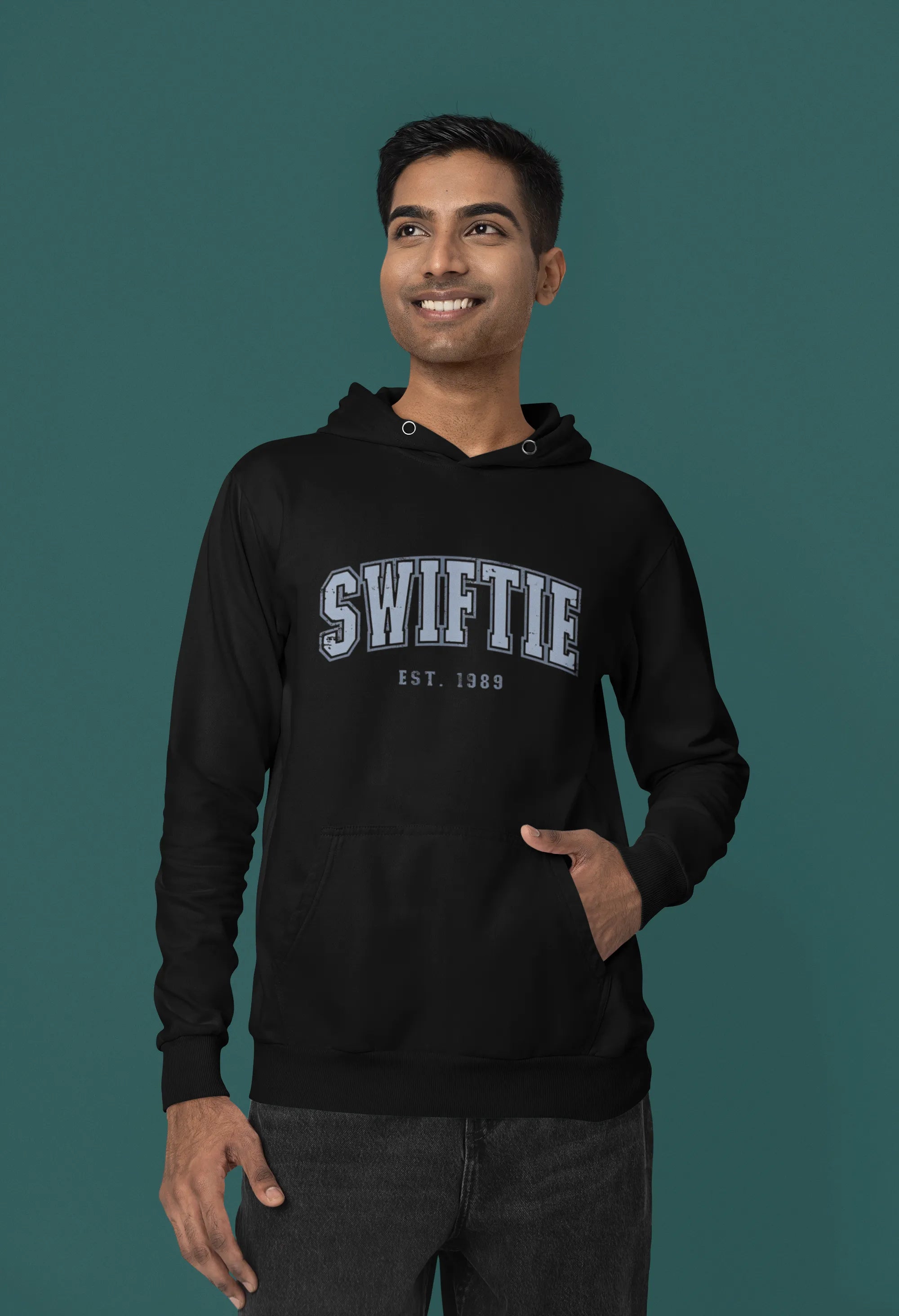 First front view of a male Model wearing an black Swiftie hoodie, perfect for Taylor Swift fans and Eras Tour enthusiasts.