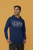 Side view of a male model wearing a navy blue oversized, cozy hoodie featuring 