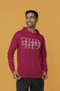 Side view of a male model wearing a maroon oversized, cozy hoodie featuring 