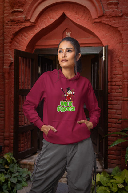 Front view of a female model wearing a maroon hoodie with a Disney Uncle Scrooge design, showing dollar bills raining down on him.