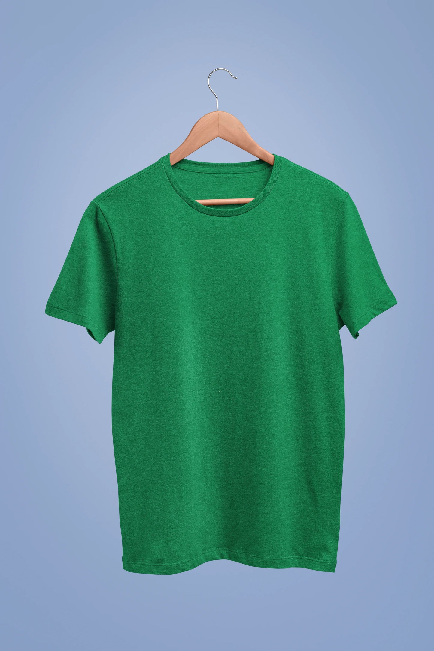 Front view of a forest green oversized t-shirt featuring a captivating "moonlight" design with subtle elements of the Milky Way galaxy, planets, and the soft glow of the moon.