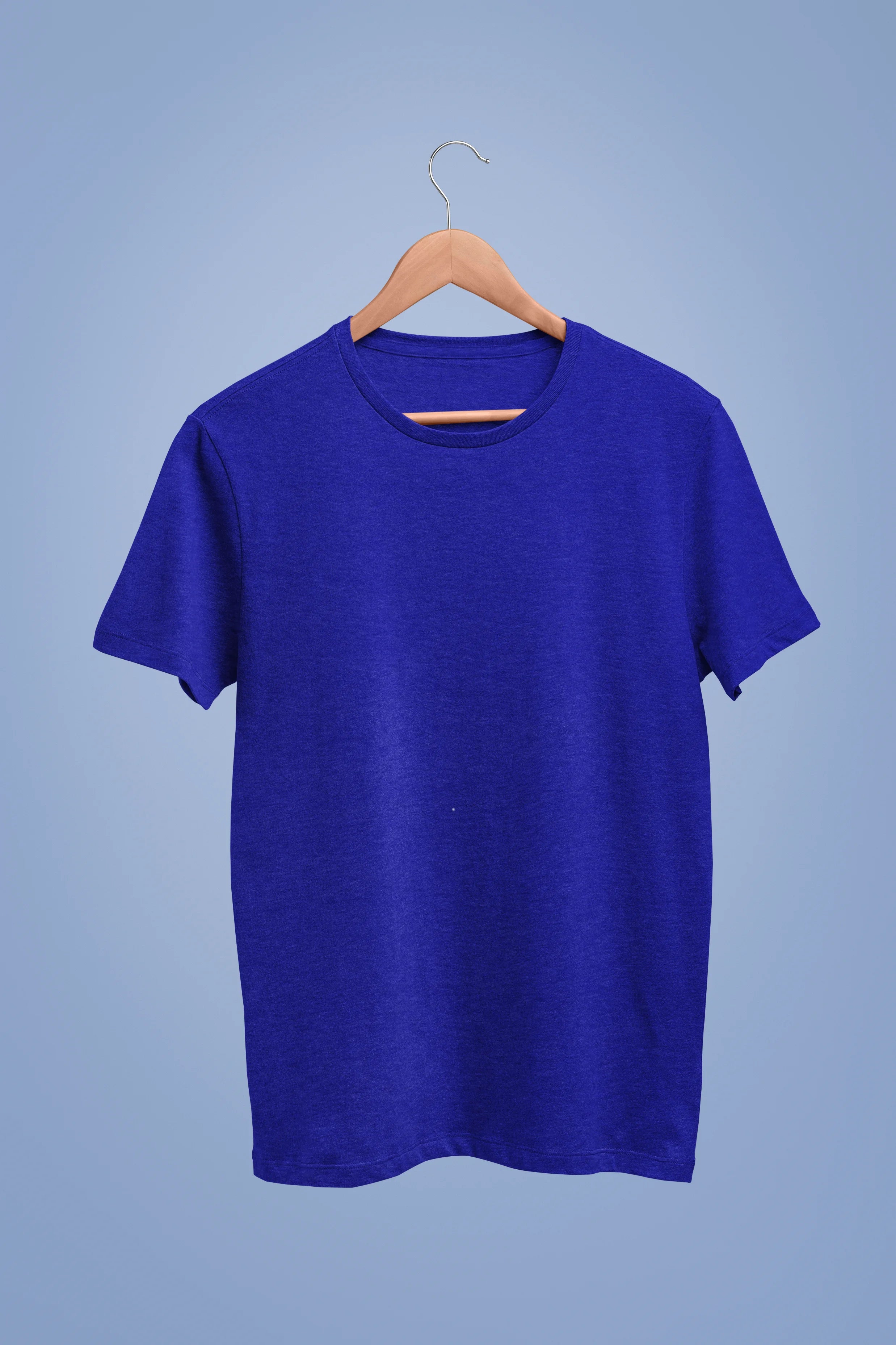 Front view of a royal blue oversized t-shirt featuring a captivating "moonlight" design with subtle elements of the Milky Way galaxy, planets, and the soft glow of the moon.