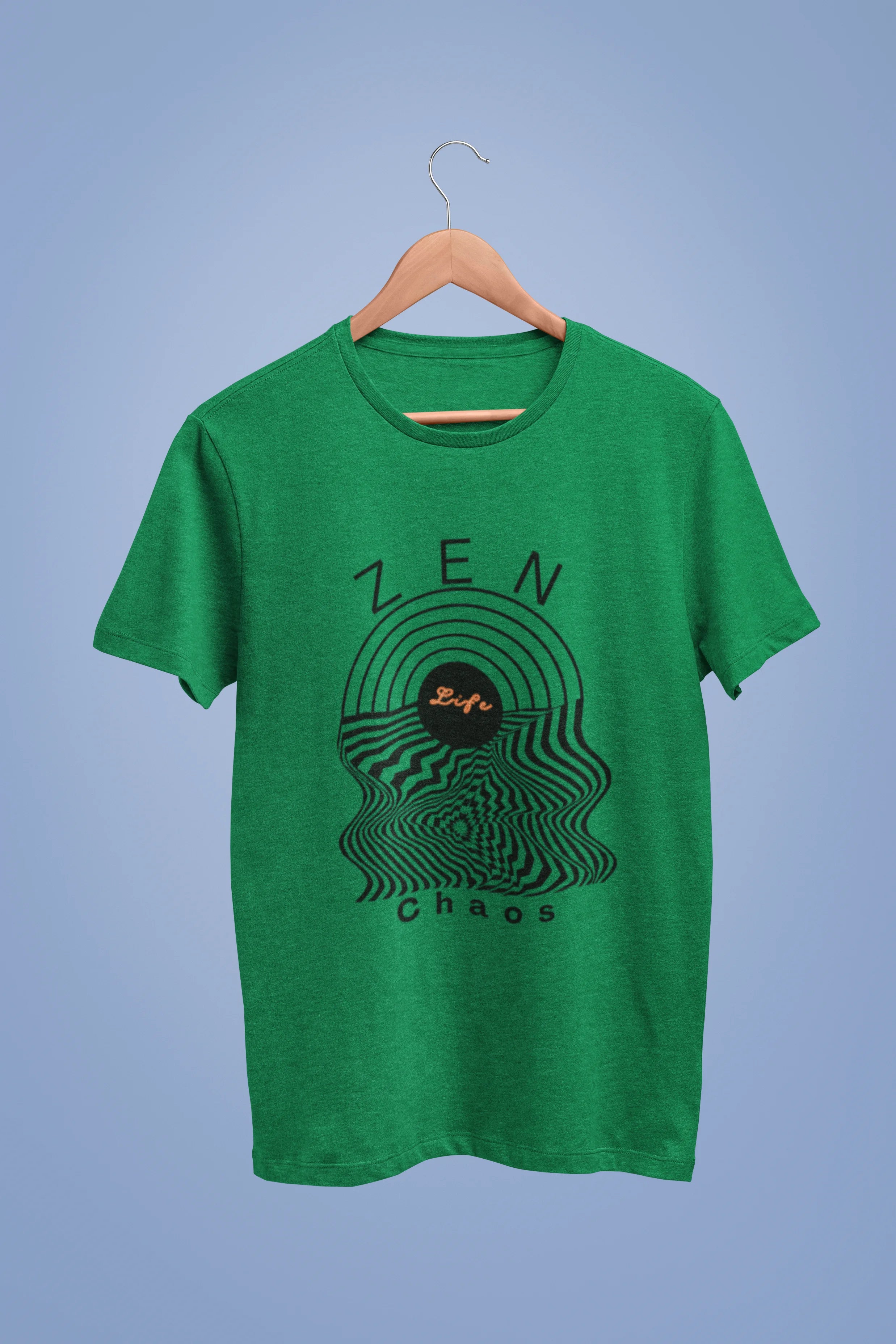 Front view of a forest green oversized t-shirt featuring an aesthetic design of a setting sun and crashing waves with the text "Zen & Chaos" above it. Ideal for those who love philosophical themes and visually striking clothing.