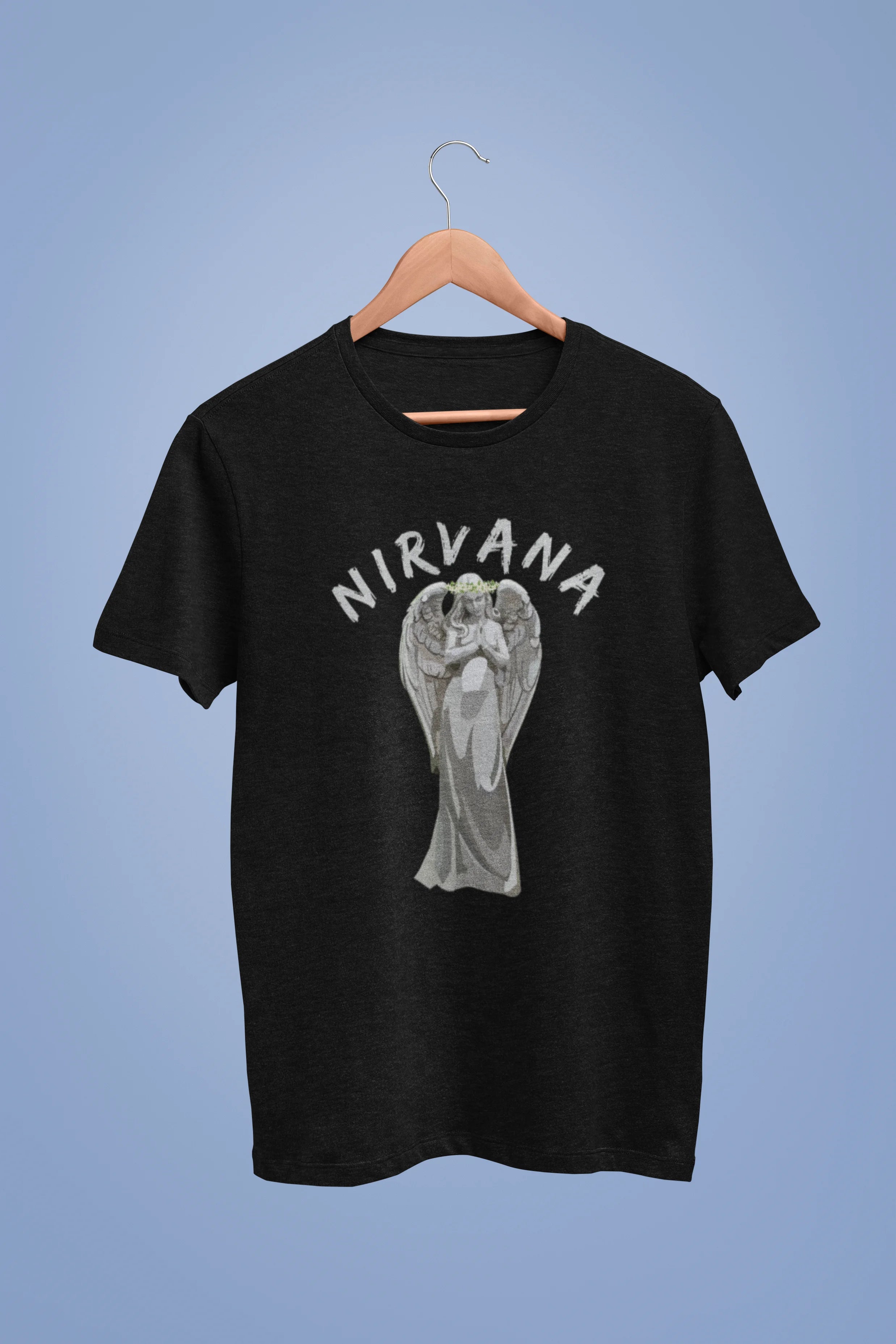 Front image of a black oversized t-shirt featuring a design of a winged angel with the text "Nirvana" above it. Ideal for fans of Nirvana and those who love grunge aesthetics.