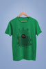 Front view of a forest green oversized t-shirt featuring an aesthetic design of a setting sun and crashing waves with the text 