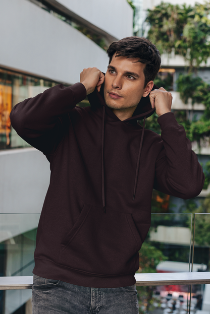 Front view of a male model wearing a chocolate brown premium quality, pure cotton hoodie.