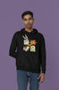 Fourth image of a male model wearing a black hoodie with a large Looney Tunes design. The illustration features portraits of several iconic Looney Tunes characters.