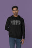 Second front view of a male model wearing a black oversized, cozy hoodie featuring 