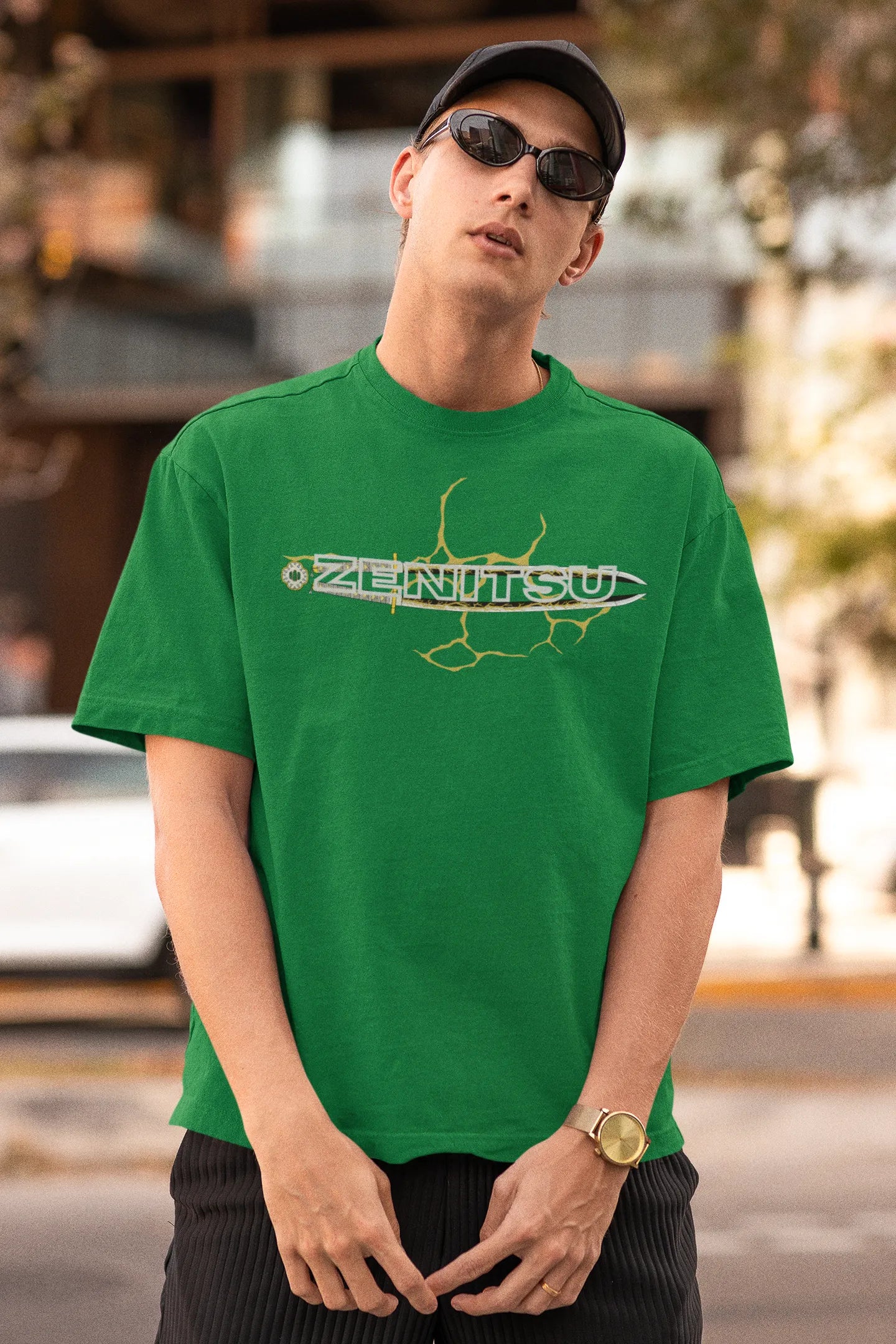 First front view of a male model wearing a forest green oversized t-shirt featuring Zenitsu Agatsuma with the text "High Voltage".