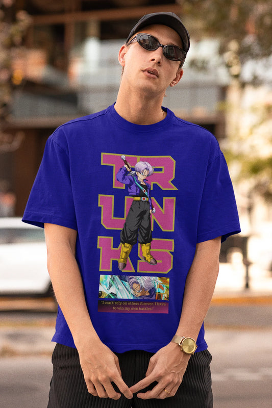First front view of a male model wearing a royal blue oversized t-shirt featuring Trunks from Dragon Ball Z with the text "Trunks."