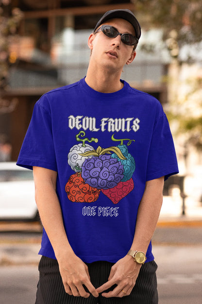 3rd front view of a male model wearing a royal blue oversized t-shirt featuring a design of a Devil Fruit from the One Piece anime.