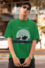 First image of male model showcasing forest green oversized t-shirts inspired by Hakuna Matata from Disney's Lion King, featuring Pumbaa, Simba and other iconic characters.