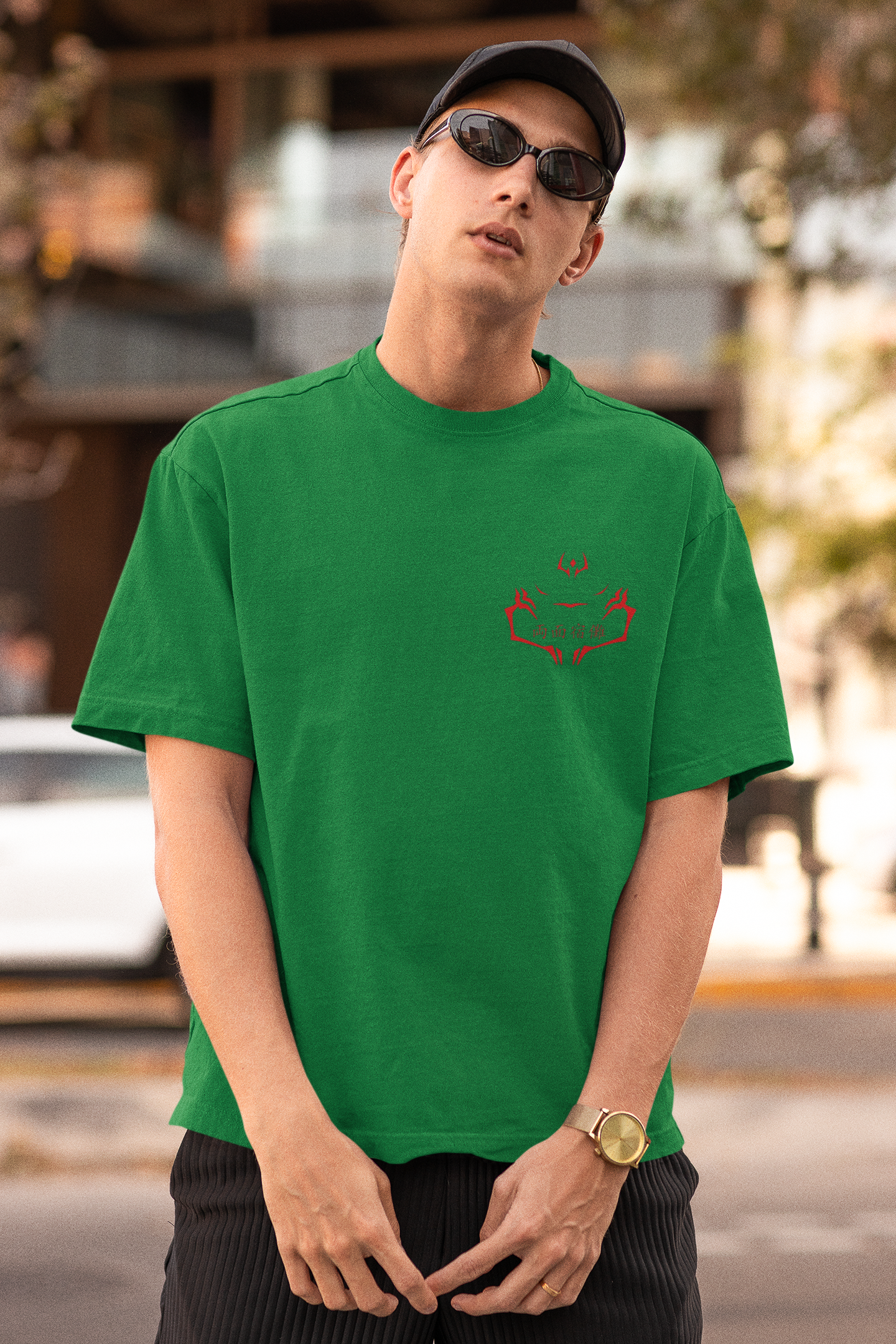 First front view of a male model wearing a forest green oversized t-shirt featuring Ryomen Sukuna with the text "I'm Sakuna."